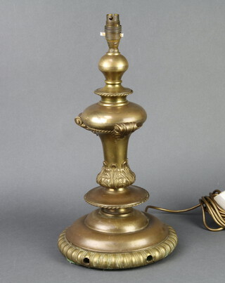 A gilt metal table lamp of baluster form raised on a spreading base 48cm h x 24cm 
