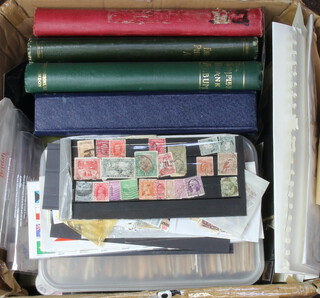 An album of presentation stamps, a collection of world stamps on paper and loose 