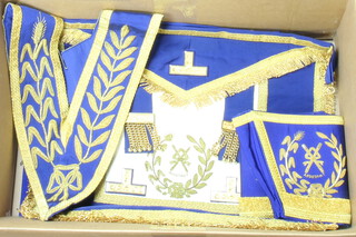 A quantity of various Masonic regalia comprising Assistant Grand Director of Ceremonies full dress apron, gauntlets, collar and collar jewel together with an undress apron and collar 