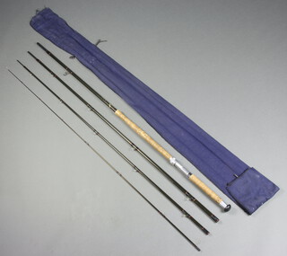A Hardy/Greys 18', four piece, salmon fly fishing rod in blue cloth bag 