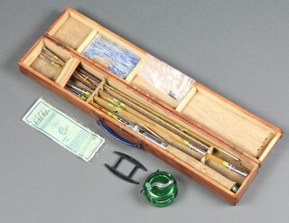 A MJP split cane five piece fishing rod together with a 6-50 Anglen fishing rod in a wooden carrying case