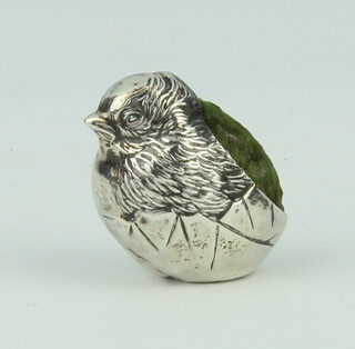 An Edwardian novelty silver pin cushion in the form of a chick 3cm, Chester 1908
