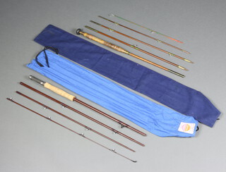 An early 20th Century five piece fly fishing rod and a 1960's fibreglass four piece travelling fly rod with cloth bags