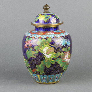 A Chinese blue and floral patterned cloisonne enamel jar and cover 22cm h x 8cm diam. 