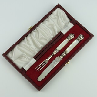 A William IV mother of pearl and silver mounted knife and fork, Sheffield 1834 