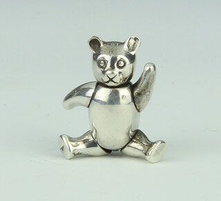 A Sterling silver pin in the form of a bear with articulated arms 13.3 grams, 30mm
