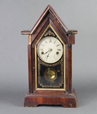 An American shelf clock with 16cm painted dial, contained in a mahogany Cathedral door style case 17cm h x 23cm w x 10cm d 