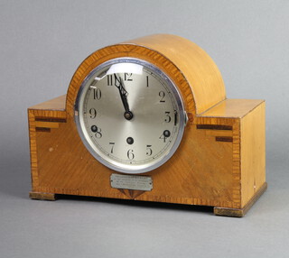 A 1930's Continental Art Deco 8 day striking mantel clock with 14cm silvered dial, complete with pendulum key and contained in an inlaid walnut case 24cm h x 31cm w x 14cm d 

