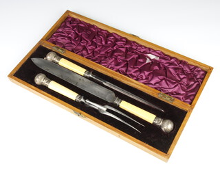 An Edwardian 3 piece silver mounted carving set contained in an inlaid case  
