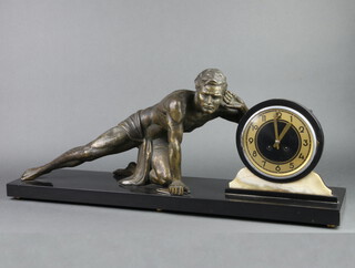 Fini Paris, JS 48569, a French Art Deco 8 day mantel clock with gilt chapter ring and Arabic numerals contained in a 2 colour marble case supported by a spelter figure of a crouching gentleman 33cm h x 82cm w x 20cm d, complete with pendulum and key  