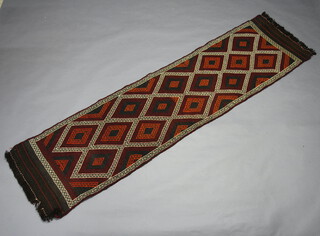 A black, white and red ground Suzni Kilim runner with all over diamond design 280cm x 74cm 