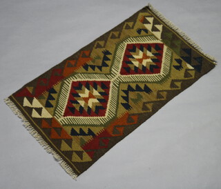 A green, brown and black ground Maimana Kilim rug with all over geometric design 195cm x 56cm 