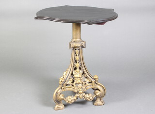 A 19th Century style shaped ebonised occasional table, raised on a pierced gilt painted cast iron base with lion mask decoration 70cm h x 59cm w x 50cm d 