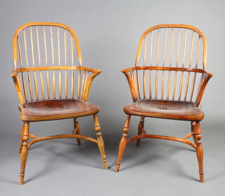 A pair of 20th Century, 18th Century style elm stick and rail back carver chairs with solid seats, raised on turned supports with inlaid stretcher 100cm h x 59cm w x 47cm d (seat 32cm x 32cm) 