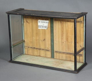 A Victorian ebonised shop display cabinet, the back fitted 2 hinged doors 79cm h x 115cm w x 42cm d 