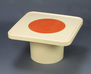 Robin Day for Hille, a 1960`s plastic coffee table in cream/white with central circular orange storage cover.