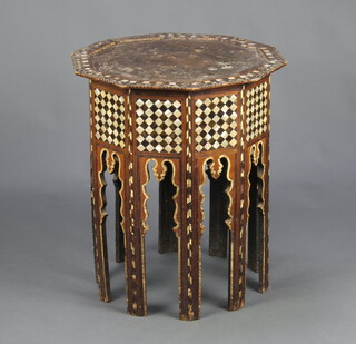 A Moorish hardwood and inlaid mother of pearl decagonal (10 sided) occasional table fitted a frieze drawer 69cm h x 59cm w x 59cm d 