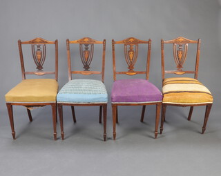 A set of 4 Edwardian inlaid rosewood dining chairs with overstuffed seats raised on square tapered supports, spade feet 80cm h x 44cm w x 40cm d (seat 26cm x 32cm)  