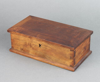 A 1930's rectangular hardwood box with hinged lid, the interior fitted a tray 8cm h x 24cm w x 13cm d 