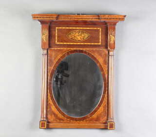 A 19th Century oval plate mirror contained in an inlaid mahogany frame with shaped cornice, inlaid a panel of the seated Britannia lion 54cm h x 44cm w x 8cm d