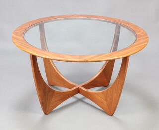 G-Plan, a mid Century circular teak Astro coffee table with plate glass top 47cm h x 83cm diam. 
