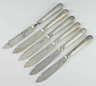 Six silver fish knives with shell grips, Sheffield 1872 (1 a/f)