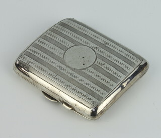 A silver engine turned cigarette case Chester 1918, gross 98 grams 