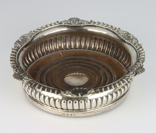 A George III silver wine coaster with scroll rim, London 1808, 16cm 