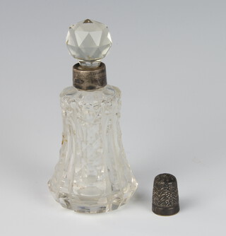 A silver mounted toilet bottle 11cm together with a ditto thimble 