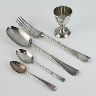 A George III silver tablespoon, 2 teaspoons, fork and an egg cup, 216 grams 