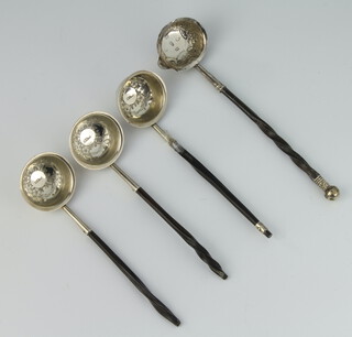 Three Victorian silver Scottish ladles with whalebone handles Edinburgh, an Irish ditto rubbed marks, (all a/f) 