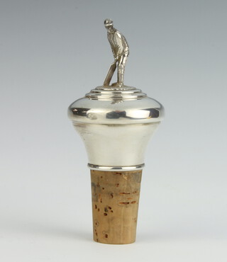 A modern 925 standard bottle stopper with a cricketer finial 