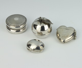 An Edwardian novelty silver vesta in the form of a heart together with 3 boxes 