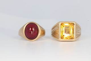A gentleman's 9ct yellow gold signet ring set with a citrine size P, ditto with a cabuchon garnet size P 1/2, 13.4 grams gross