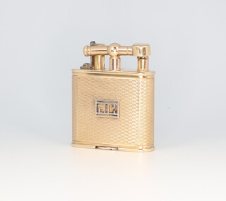 Dunhill, an Art Deco 9ct yellow gold Dunhill engine turned cigarette lighter with white metal initials JC, stamped Asprey & Co Limited, New Bond Street, no.143752 4.5cm 