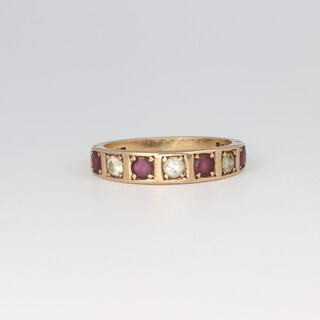 A 9ct yellow gold ruby and diamond ring, 3.6 grams, size R