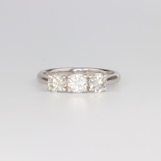 An 18ct white gold 3 stone diamond ring approx. 0.92ct, 3 grams, size M, with a WGI certificate 