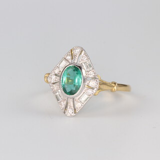 An Edwardian style 18ct yellow gold emerald and diamond ring, the oval cut emerald approx. 1.8ct, the brilliant cut diamonds 0.3ct, 3.2 grams, size O 