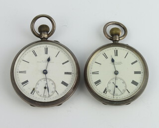 An Edwardian silver cased mechanical pocket watch with seconds at 6 o'clock, London 1904 in a 48mm case together with a ditto London 1901 in a 50mm case 