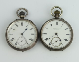 An Edwardian silver cased mechanical pocket watch Birmingham 1885 in a 50mm case and a ditto Chester 1901 in a 52mm case 