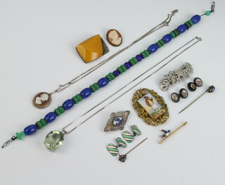 A silver and amberoid brooch and minor costume and other jewellery including a gold enamelled pin 