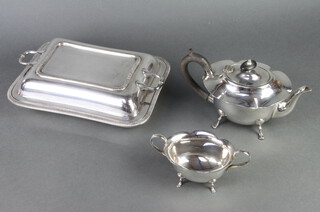 A silver plated entree set, teapot and sugar bowl 