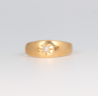 An 18ct yellow gold single stone gypsy ring 0.03ct, 2.5 grams 