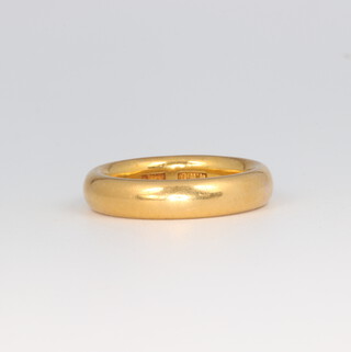 A 22ct yellow gold wedding band 10.5 grams, size L 1/2