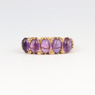 A 9ct five stone oval cabochon amethyst ring size M 1/2, 5.1 grams 