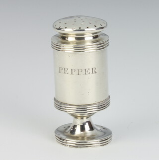 A Continental white metal cylindrical pepper, engraved and with ribbed decoration 78 grams, 8cm 