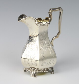 A Victorian silver hexagonal cream jug decorated with scrolls and vacant cartouche on scroll feet, London 1847, 260 grams, 14cm  