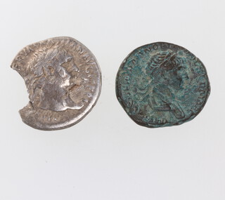 A Trajan bronze coin and a ditto silver 