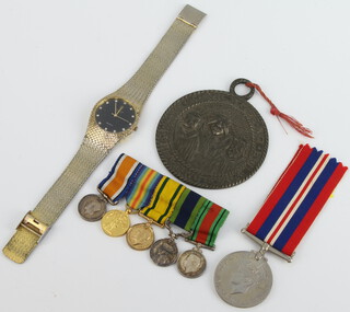 A First World War miniature medal group comprising War medal, Victory medal, Territorial Force War medal, India General Service medal and Defence medal and minor other items 