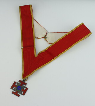 A silver and enamelled Scottish Rite 32 degree Masonic jewel on a silk collar, engraved Harry Randall 25 Jan 1946 